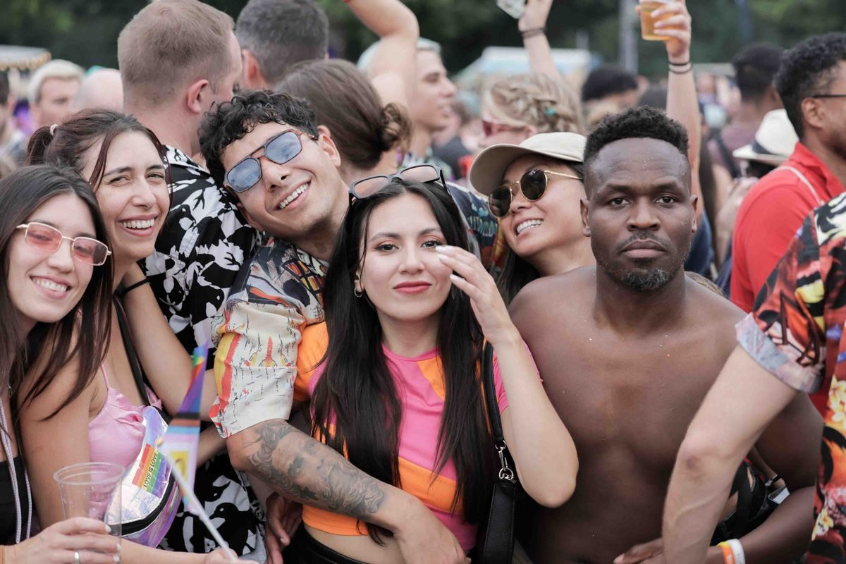 Friends enjoying an outdoor music festival together.